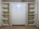 Large wardrobe with doors opening to reveal shelving at 9923 Se 64Th Ave, Belleview, FL 34420