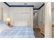 Bedroom showcasing a stylish bed, closet with sliding doors, and a neutral color scheme at 9925 Sw 95Th Loop, Ocala, FL 34481