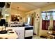 Bright kitchen features essential appliances, ample counter space, and a quaint dining area by the window at 8896 Sw 116Th Place Rd, Ocala, FL 34481