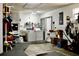 Spacious laundry room with a washer and dryer, utility sink, and ample storage space at 8896 Sw 116Th Place Rd, Ocala, FL 34481