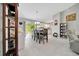 Bright open floor plan: dining area with sliding door access to the outdoors at 1133 Nw 122Nd Pl, Citra, FL 32113
