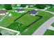Aerial view of a house with a fenced backyard and a lush lawn, perfect for outdoor activities at 11330 Sw 61St Cir, Ocala, FL 34476