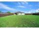 Expansive backyard with a privacy fence, offering ample space for recreation and relaxation at 11330 Sw 61St Cir, Ocala, FL 34476