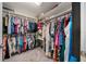 Spacious walk-in closet with ample shelving and hanging space for organized storage at 11330 Sw 61St Cir, Ocala, FL 34476