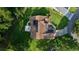 An aerial view shows the layout with a fire pit, patio, and solar panels on the roof at 11598 Sw 74Th Ct, Ocala, FL 34476