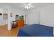 Bright bedroom with ample natural light, ceiling fan and closet at 11598 Sw 74Th Ct, Ocala, FL 34476