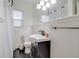 Bathroom featuring a vanity, sink, toilet, and tiled floors at 1501 Ne 97Th Street Rd, Anthony, FL 32617
