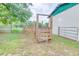 View of a wooden corral in grassy field at 1501 Ne 97Th Street Rd, Anthony, FL 32617