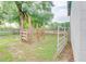 View of a wooden corral in grassy field at 1501 Ne 97Th Street Rd, Anthony, FL 32617