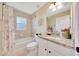 Charming bathroom featuring granite counters, neutral walls, and shower/tub combo offers a functional and stylish space at 1689 Ne 161St Pl, Citra, FL 32113