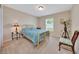 Inviting bedroom featuring ample natural light, complemented by stylish furnishings, creating a tranquil retreat at 1689 Ne 161St Pl, Citra, FL 32113