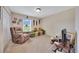 Cozy living room with plush seating, and natural light, providing a relaxing and inviting atmosphere at 1689 Ne 161St Pl, Citra, FL 32113