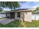 The home's exterior features a screened lanai and brick patio providing a private and shaded outdoor space at 2127 Ne 38Th Ter, Ocala, FL 34470