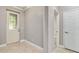 Inviting foyer with tile flooring, neutral walls, and decorative trim at 2127 Ne 38Th Ter, Ocala, FL 34470