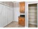 Hallway with cabinets, closet space, and a pantry for ample storage at 2127 Ne 38Th Ter, Ocala, FL 34470