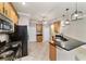 Spacious kitchen featuring granite countertops and stainless steel appliances at 2127 Ne 38Th Ter, Ocala, FL 34470