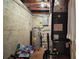 Basement featuring a water heater and HVAC system at 2155 Nw 27Th Ave, Ocala, FL 34475