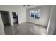 A bright bedroom featuring tile floors and closet at 2283 Sw 140Th Ct, Ocala, FL 34481