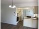 Kitchen featuring white appliances, ample cabinet space, and a breakfast bar for casual dining at 3381 Nw 44Th Ct, Ocala, FL 34482