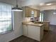 Well-lit kitchen with lots of counter space and cabinets, ideal for cooking and entertaining at 3381 Nw 44Th Ct, Ocala, FL 34482