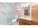 Bathroom featuring a shower, toilet, and vanity with sink at 3515 Ne 43Rd Pl, Ocala, FL 34479