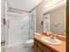 Bathroom showcasing a shower, toilet, and vanity with sink at 3515 Ne 43Rd Pl, Ocala, FL 34479