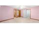Spacious bedroom featuring tile floors, ceiling fan and closet space at 3515 Ne 43Rd Pl, Ocala, FL 34479