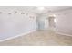 Spacious bedroom featuring tile floors and a mirrored closet door at 3515 Ne 43Rd Pl, Ocala, FL 34479