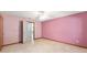 Bright bedroom with tile flooring and light pink walls at 3515 Ne 43Rd Pl, Ocala, FL 34479