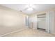 Bedroom with tile flooring and access to the closet and bathroom at 3515 Ne 43Rd Pl, Ocala, FL 34479