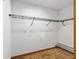 Walk-in closet with wire shelving and carpet flooring at 3515 Ne 43Rd Pl, Ocala, FL 34479