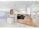 Open-concept kitchen featuring white and black cabinets, modern appliances, and an open layout at 3515 Ne 43Rd Pl, Ocala, FL 34479
