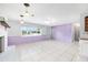 Living room area with an open concept featuring ample space and lots of natural light at 3515 Ne 43Rd Pl, Ocala, FL 34479