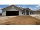 Charming single-Gathering home featuring an attached two-car garage and an inviting front entrance at 4340 Nw 1St Ave, Ocala, FL 34475