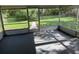 Screened-in porch providing an outdoor living space with a view of the backyard at 4701 Ne 9Th St, Ocala, FL 34470