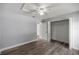 Bedroom with a closet and wood-look floors at 51 Pine Trace Loop, Ocala, FL 34472