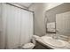 Neutral bathroom featuring single sink vanity, toilet and shower at 5239 Sw 114Th Street Rd, Ocala, FL 34476