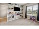 Bedroom with carpet and shelves to display shows at 5239 Sw 114Th Street Rd, Ocala, FL 34476