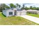 Beautiful single-story home with a two-car garage, well-maintained landscaping, and a spacious driveway at 5239 Sw 114Th Street Rd, Ocala, FL 34476