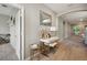 Bright hallway with decor, leading to other rooms in the house at 5239 Sw 114Th Street Rd, Ocala, FL 34476