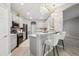 Modern kitchen featuring white cabinets and stainless steel appliances at 5239 Sw 114Th Street Rd, Ocala, FL 34476