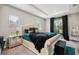 Elegantly decorated main bedroom with tray ceilings and natural light at 5239 Sw 114Th Street Rd, Ocala, FL 34476