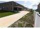 Backyard featuring a patio, screened-in porch, shed, and lawn at 5962 Sw 80Th Ln, Ocala, FL 34476