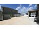Wide angle view of back porch, fence, and back yard at 5962 Sw 80Th Ln, Ocala, FL 34476