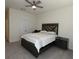 Cozy bedroom featuring a ceiling fan, modern bed, and closet at 5962 Sw 80Th Ln, Ocala, FL 34476