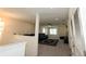 Open living room with plush seating and large windows for plenty of natural light at 5962 Sw 80Th Ln, Ocala, FL 34476
