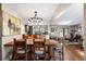 Open dining room and kitchen layout featuring hardwood floors and an airy atmosphere at 7563 Nw 21St St, Ocala, FL 34482