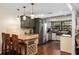 Cozy kitchen features stainless steel appliances, stylish cabinets, and a farmhouse sink at 7563 Nw 21St St, Ocala, FL 34482