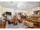 Open concept living room with hardwood floors and plenty of natural light at 7563 Nw 21St St, Ocala, FL 34482