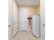 Neat mudroom with neutral walls, practical tile floors, and convenient access to storage and utility areas at 7814 Sw 97Th Cir, Ocala, FL 34481